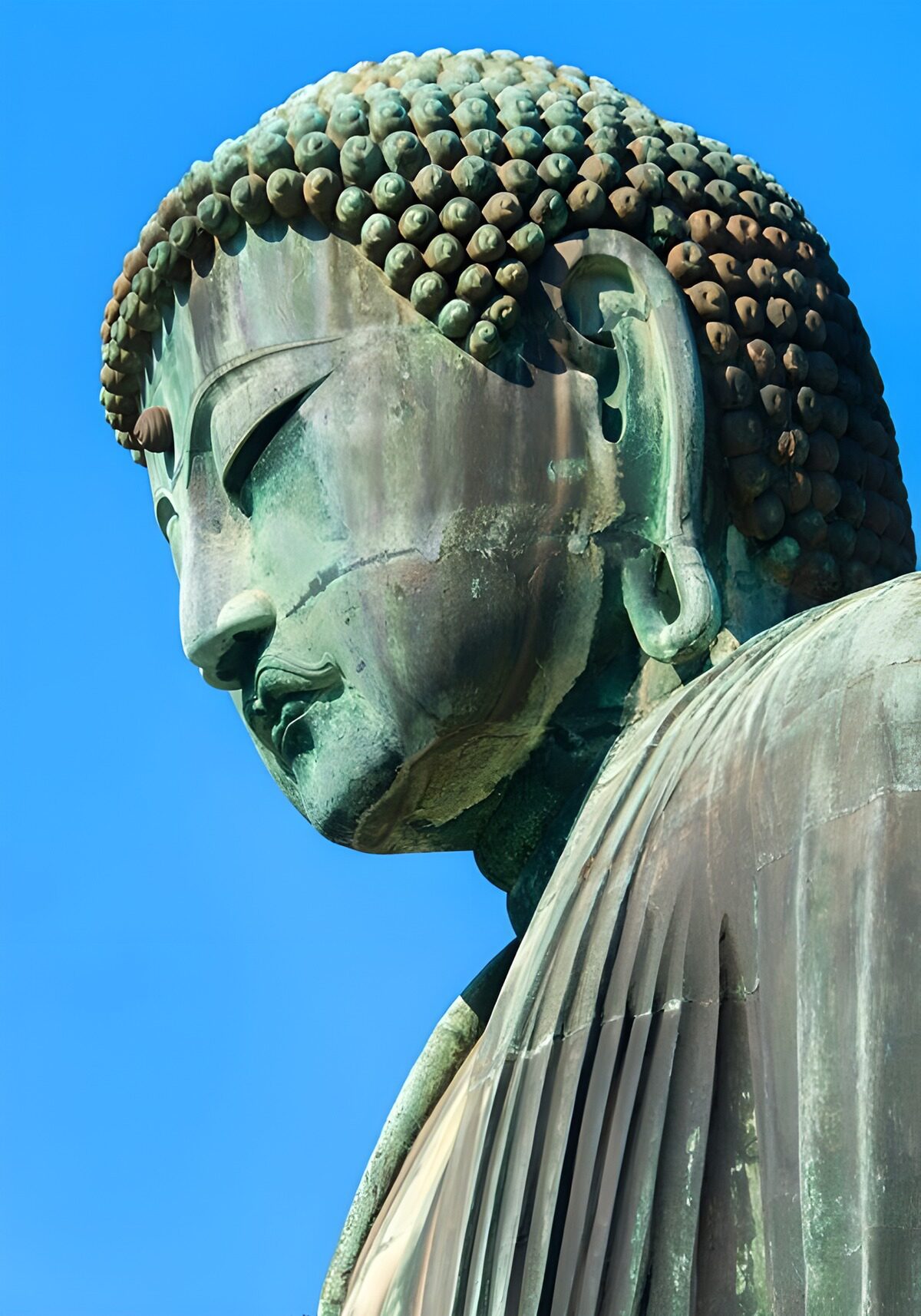 PDGIT6316590: Primo piano di un Buddha in bronzo