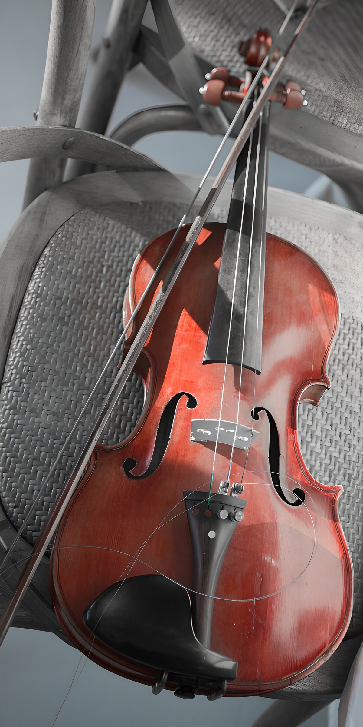 Violino e archetto tra luce e ombra